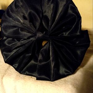 Not new,never worn black satin dressy large fan shaped double bow barrette.